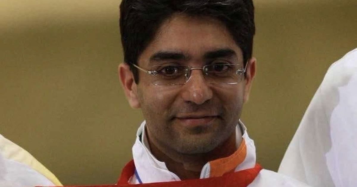 Abhinav Bindra holding his gold medal at 2008 Beijing Olympics podium ceremony