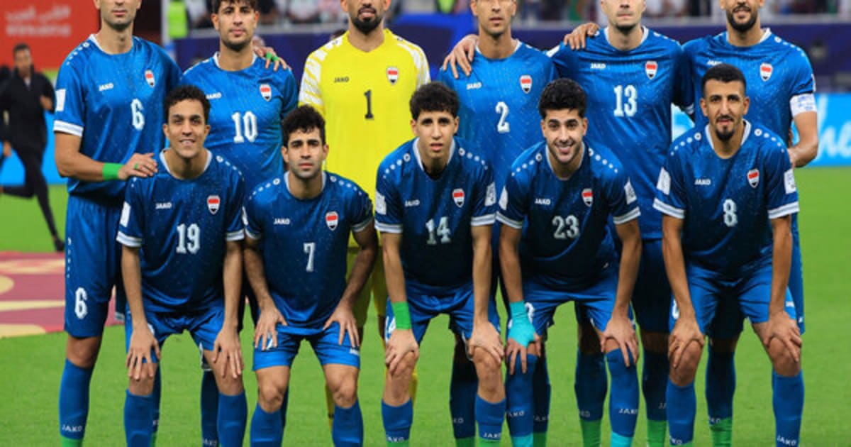 Iraqi football players celebrating historic World Cup qualification victory in green jerseys