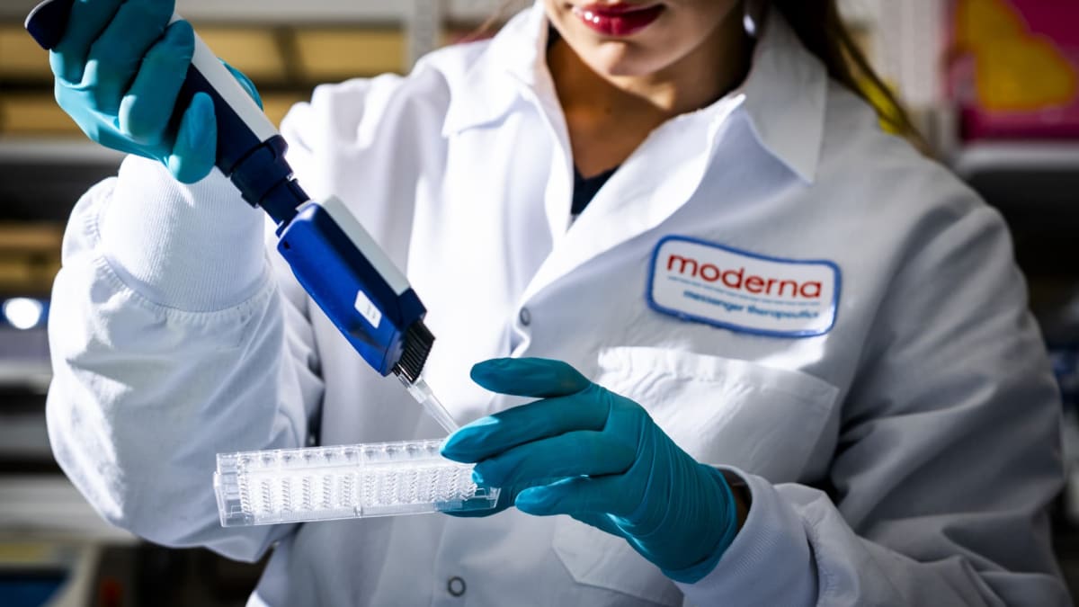 Researcher examining samples in modern laboratory at Moderna headquarters in Cambridge Massachusetts
