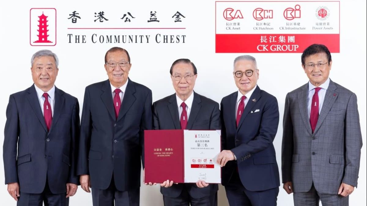 CK Asset Holdings executives present donation check to Community Chest of Hong Kong representatives