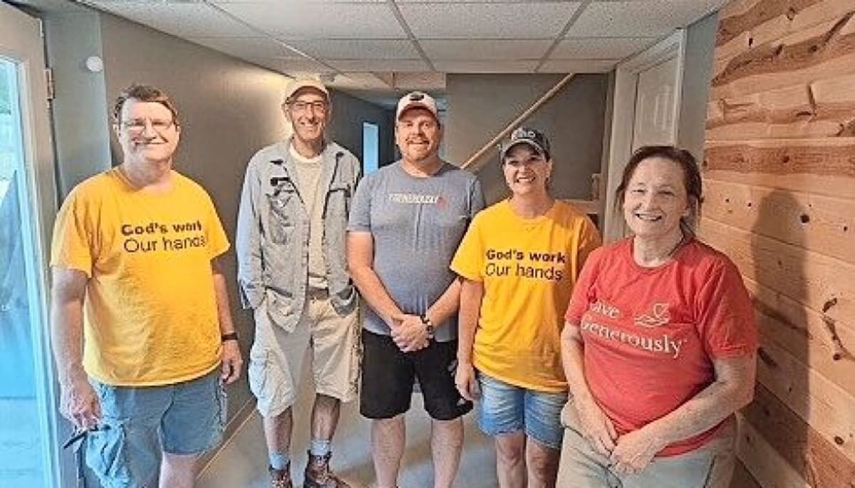 Five church volunteers from Medina, Ohio standing together before Hurricane Helene recovery work in Tennessee