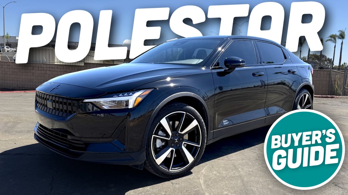 Silver Polestar 2 electric fastback sedan parked outdoors, showing sleek Scandinavian design