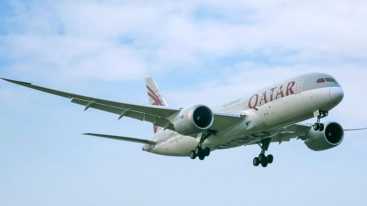 Qatar Airways aircraft on tarmac preparing for humanitarian relief flight operations