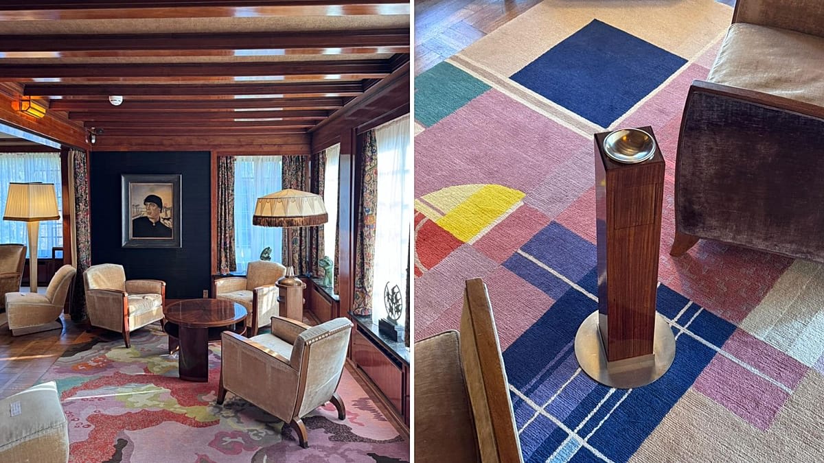 Ornate Art Nouveau interior featuring curved ironwork and stained glass windows in historic Brussels building