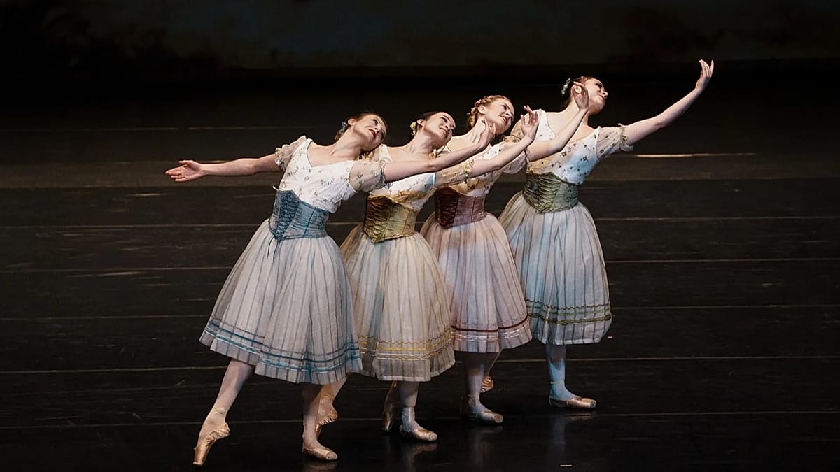 Ballet dancers from Royal Danish Theatre performing classical choreography on stage in Astana