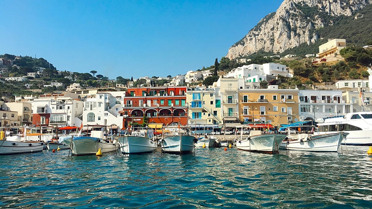 Tourists walking peacefully through the scenic streets of Capri, Italy without being approached by vendors