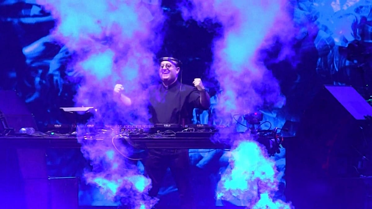 DJ priest performs at outdoor electronic music event in Buenos Aires plaza honoring Pope Francis