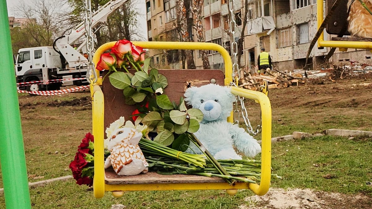 International investigators working together at computers in Europol headquarters in The Hague