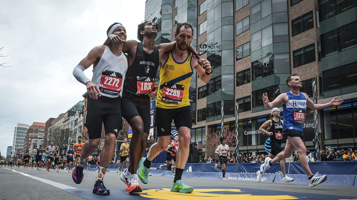 Two Runners Help Rival Cross Boston Marathon Finish Line - Image 2