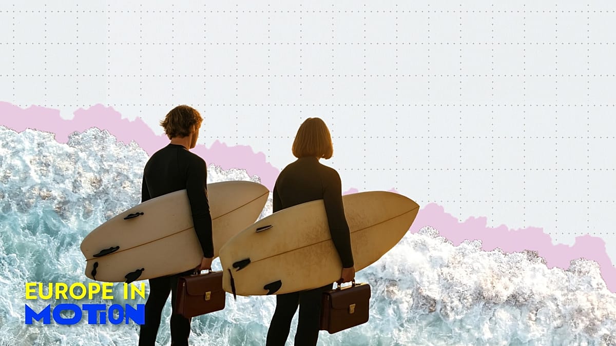 Young diverse European entrepreneurs working together on laptops in modern startup office space