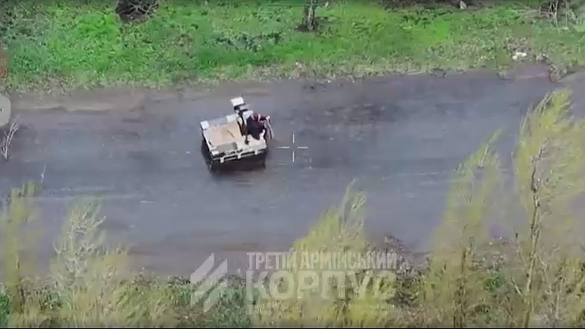 ** Autonomous ground robot vehicle on rough terrain near conflict area in Ukraine