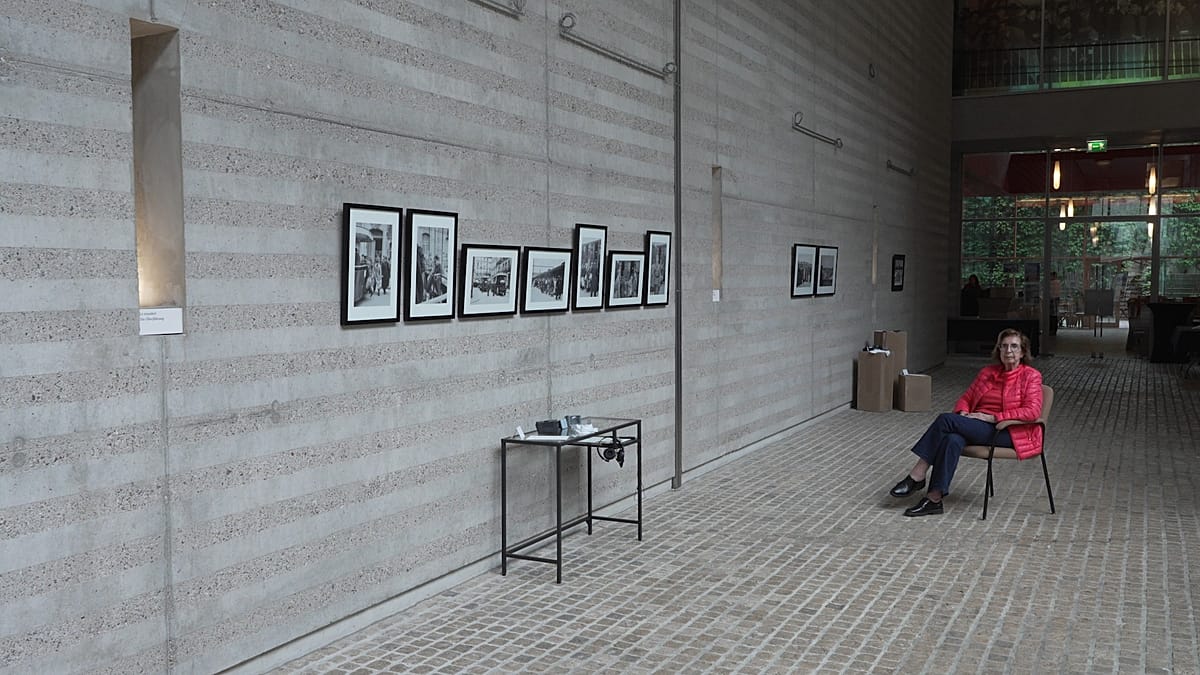 Historical black and white photographs showing Jewish men during 1941 Paris roundup displayed at exhibition