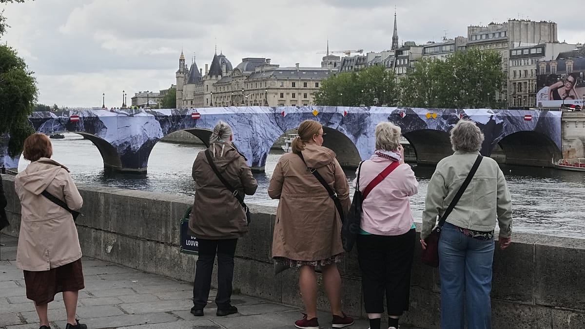 Pont Neuf bridge in Paris being transformed into cave-like art installation by artist JR