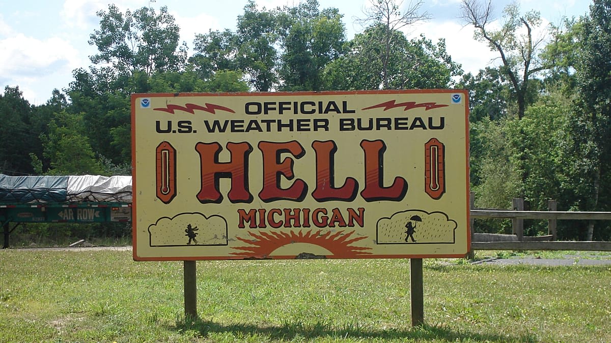 Colorful devil-themed mini golf course and buildings in Hell, Michigan tourist destination
