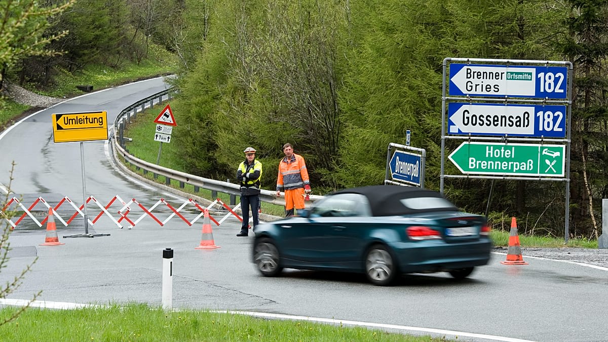 Protesters gathering peacefully on Austrian Brenner motorway demanding action on traffic pollution