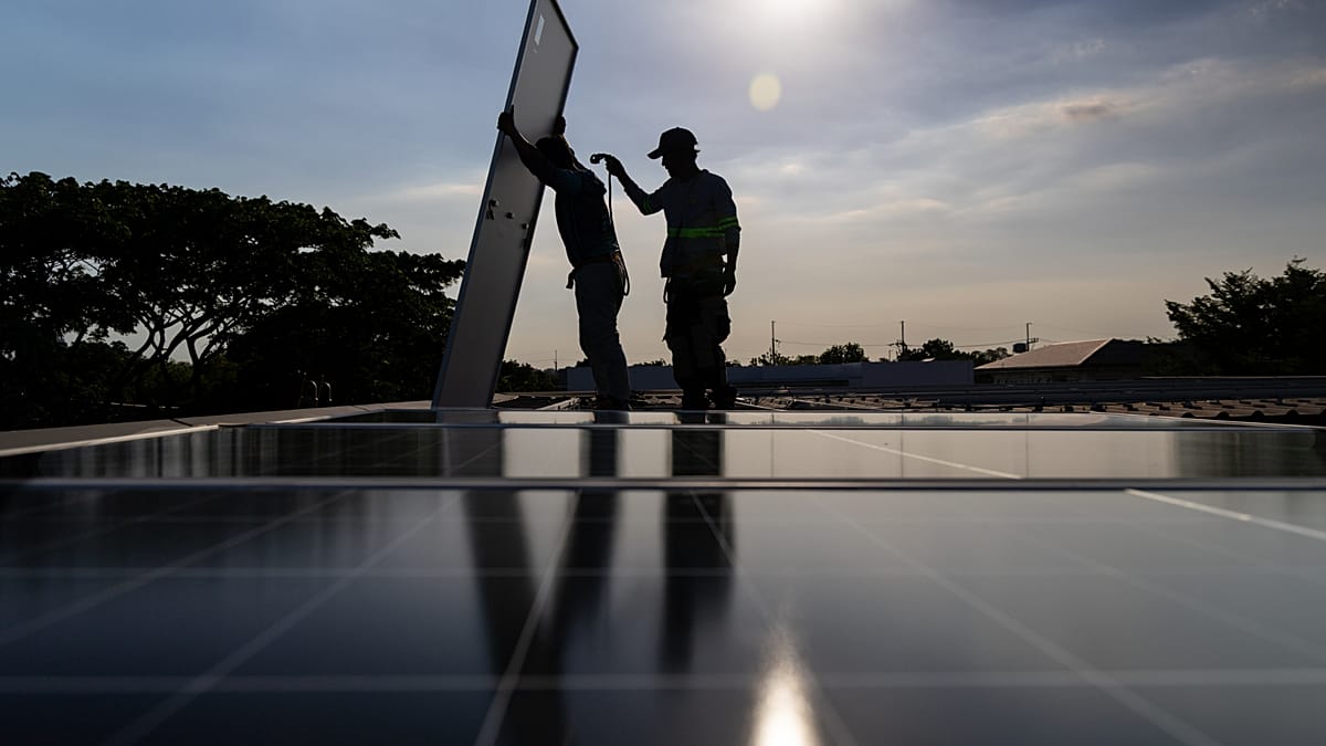Solar panels installed across European rooftops generating abundant renewable electricity under bright sunny skies