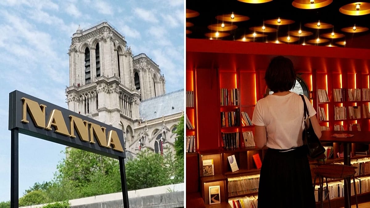 Floating barge bookshop Nanna docked on Seine River beside Notre-Dame Cathedral in Paris