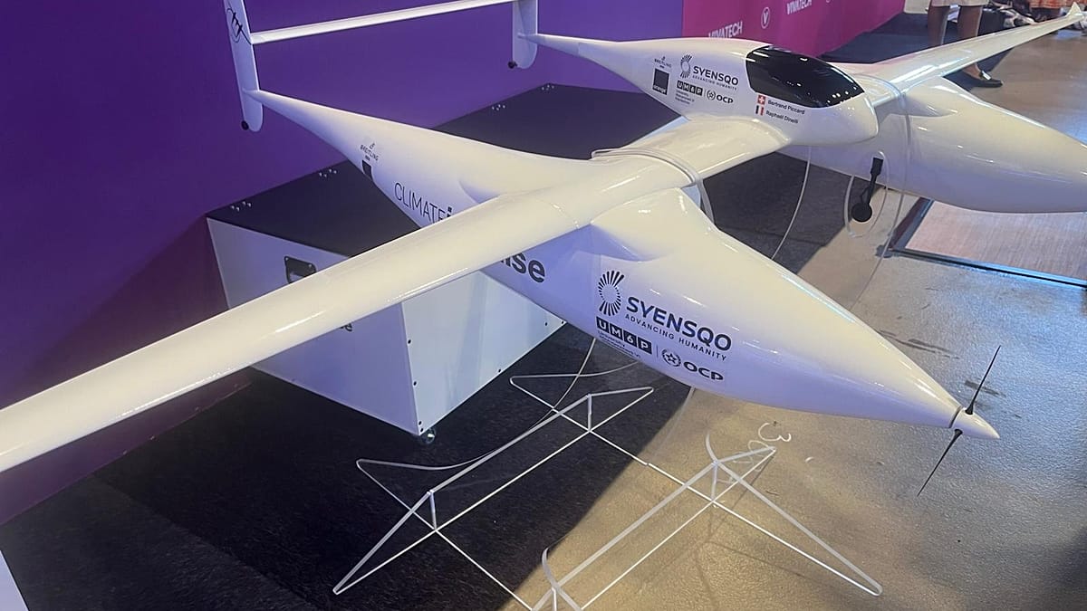 Bertrand Piccard standing beside hydrogen-powered aircraft components under construction for 2027 global flight