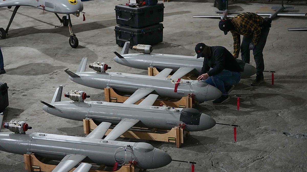 ** Modern surveillance drone flying over mountainous border terrain in Central America
