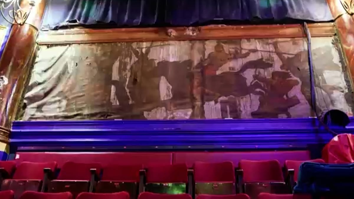Ornate historic ceiling and frescoes inside Paris's circular Cirque d'Hiver theater building