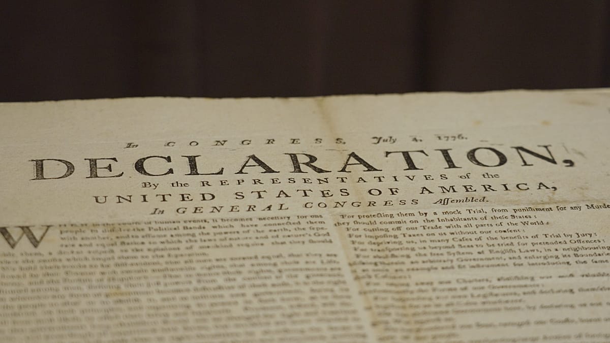 Historical printed copy of the Declaration of Independence document from 1776 preserved in archives