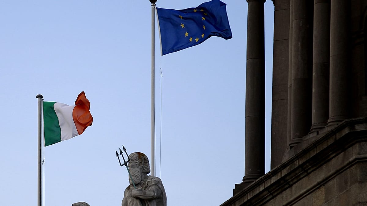 Irish and EU flags side by side representing Ireland's democratic approach to European Union leadership