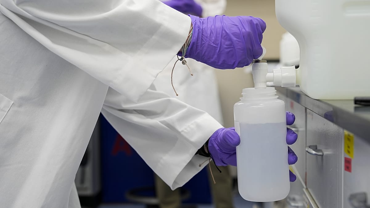 Clear drinking water being poured into glass representing improved European safety standards for forever chemicals