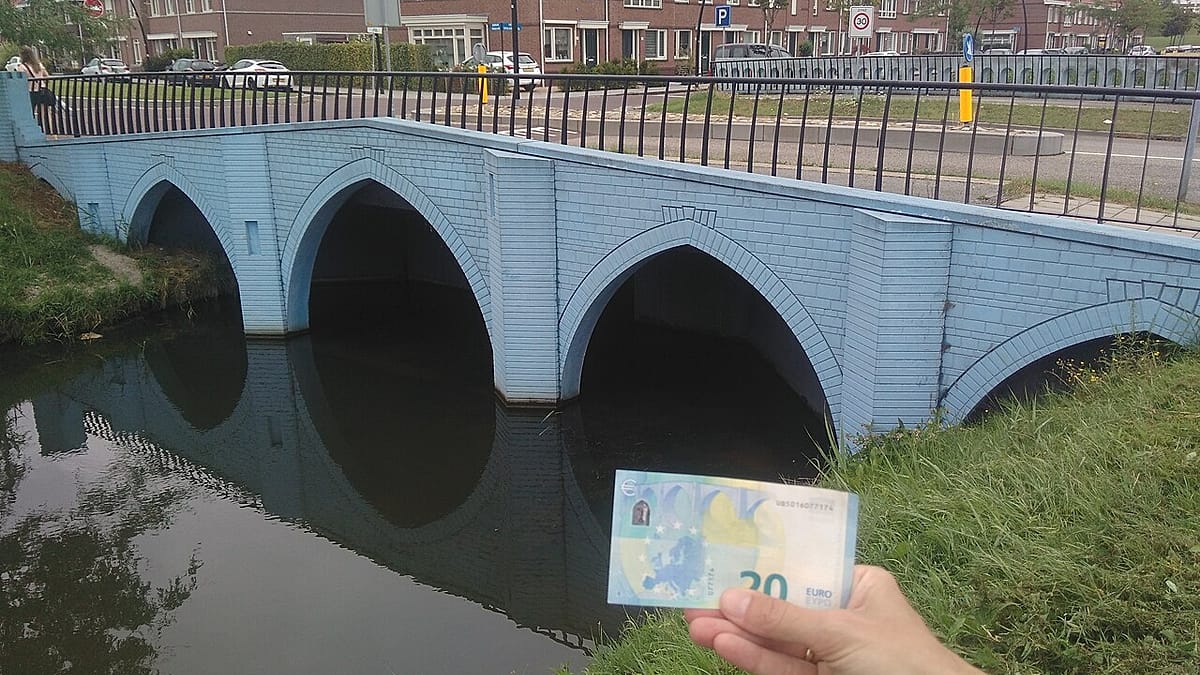 Seven colorful pedestrian bridges in Dutch town recreating every euro banknote bridge design
