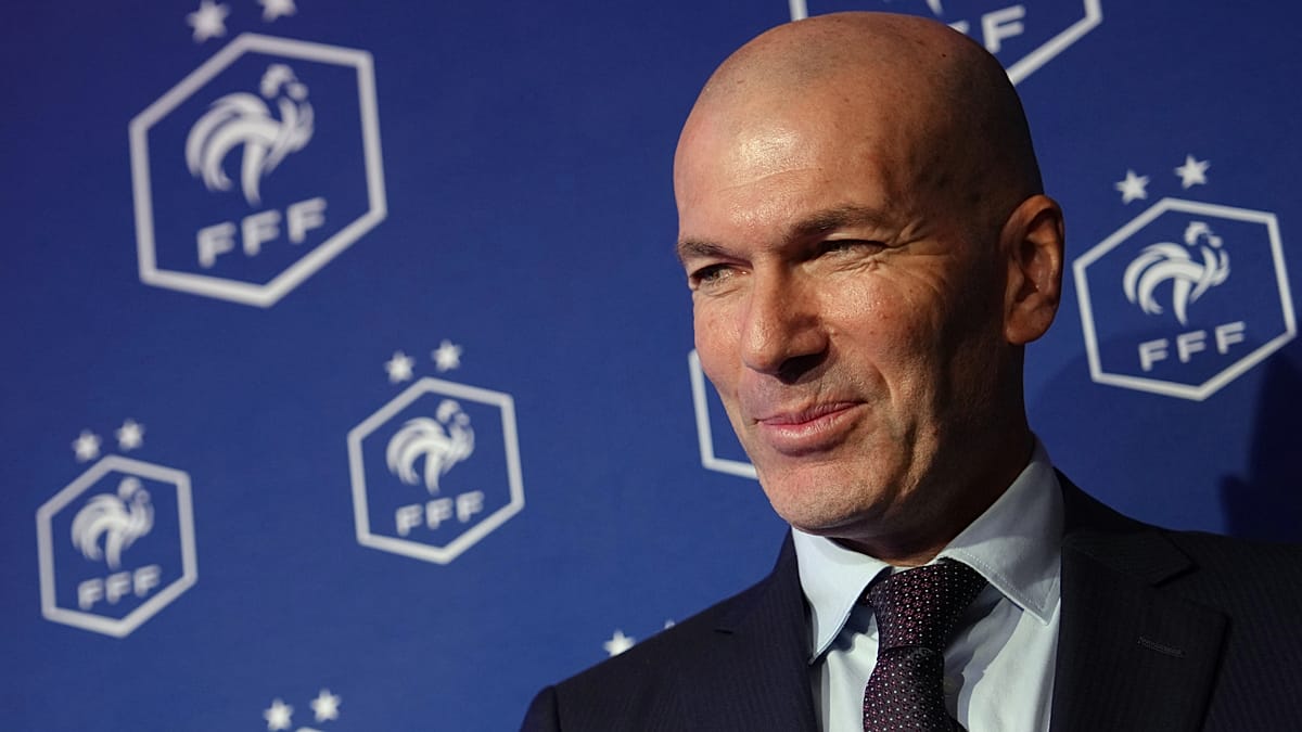 Zinedine Zidane greeting fans outside French Football Federation headquarters after coaching announcement