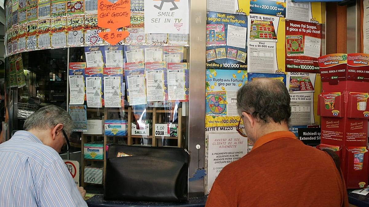Waste collection workers sorting through garbage bags searching for missing lottery ticket in Italy