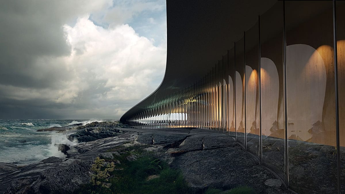 Curved modern museum building emerging from rocky Norwegian coastline overlooking Arctic Ocean waters