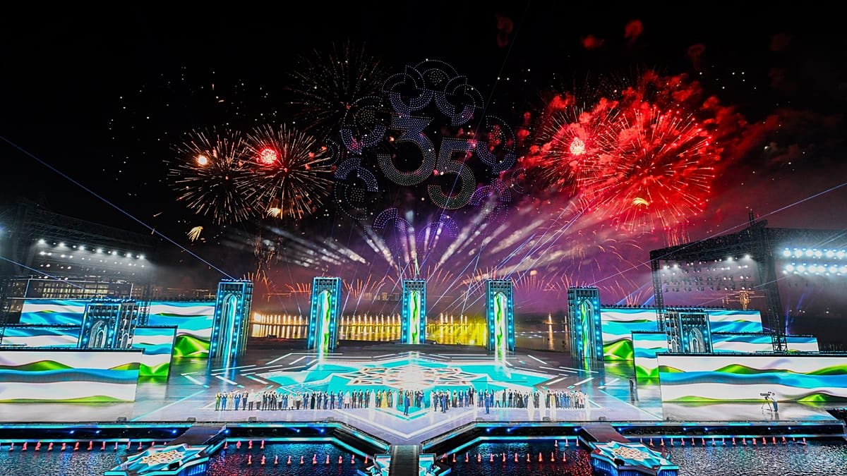 ** Drone light show illuminating night sky above New Tashkent during Uzbekistan's 35th independence celebration