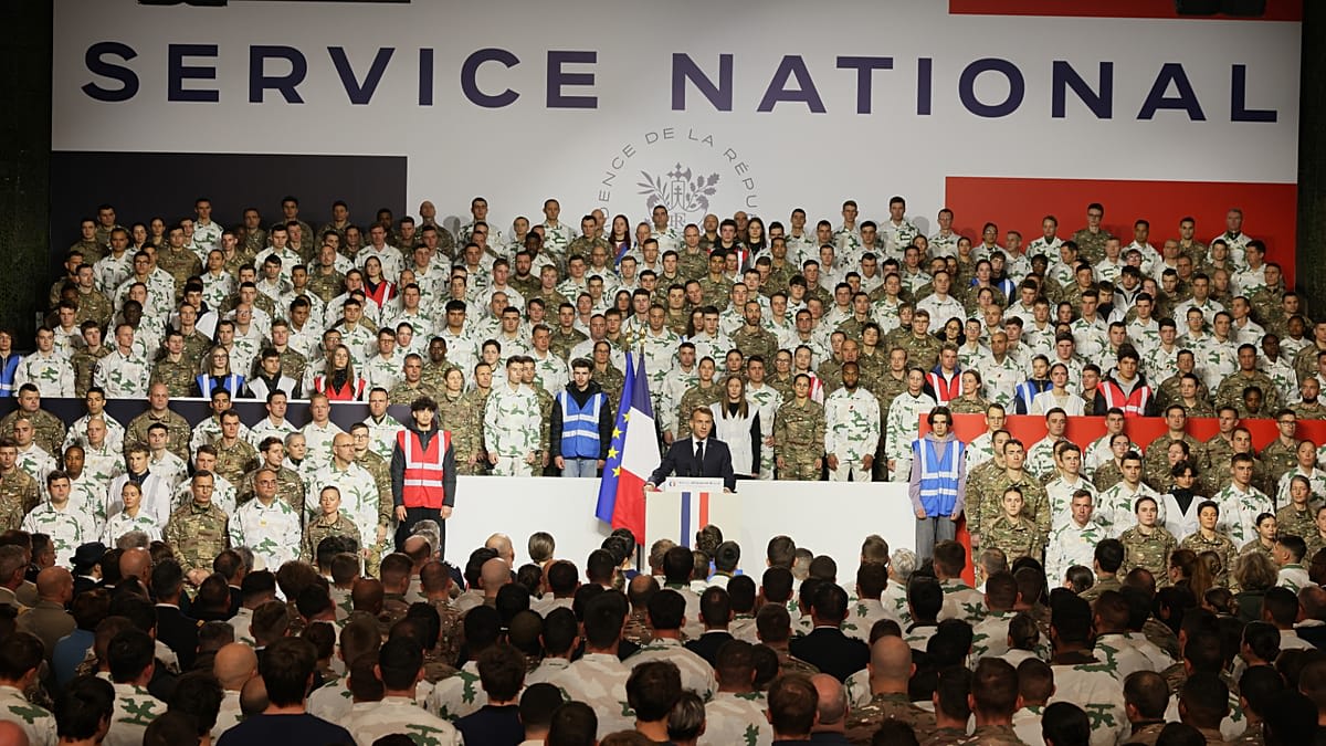 Young French volunteers in military uniform beginning their national service training program