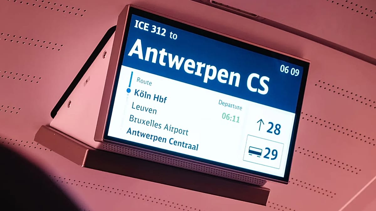 Modern high-speed Deutsche Bahn train arriving at Brussels Airport underground station platform