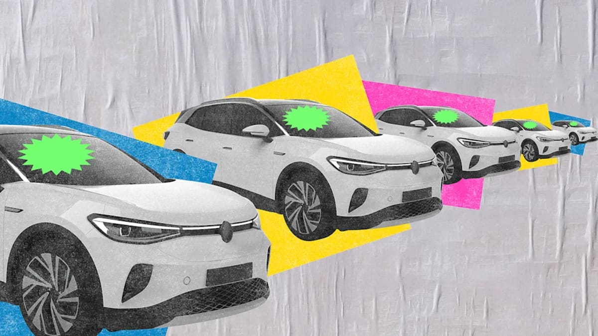 Rows of affordable used electric vehicles at dealership lot ready for budget-conscious buyers