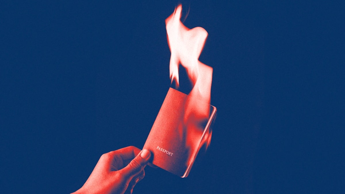 American passport and official government documents on desk representing citizenship paperwork