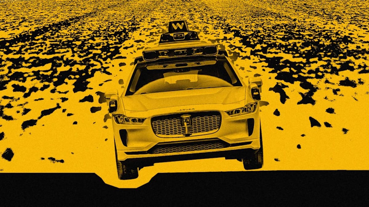 Waymo autonomous vehicle driving on city street scanning for road damage and potholes