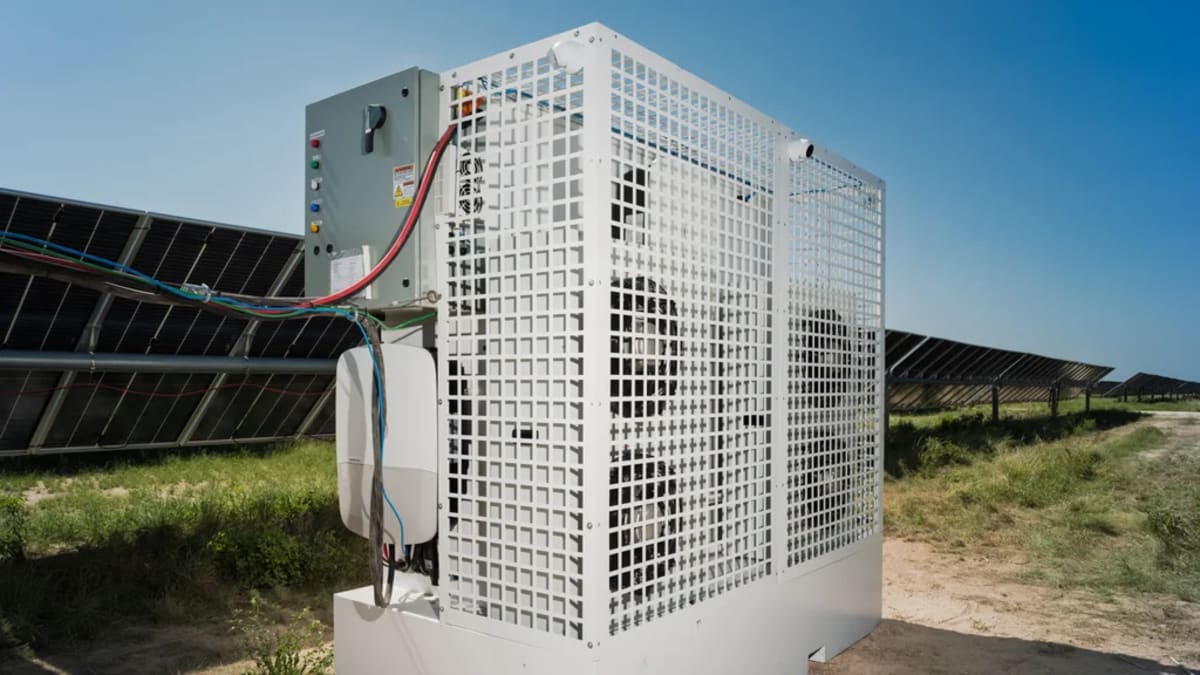 Compact white modular data center units installed at solar farm in Texas