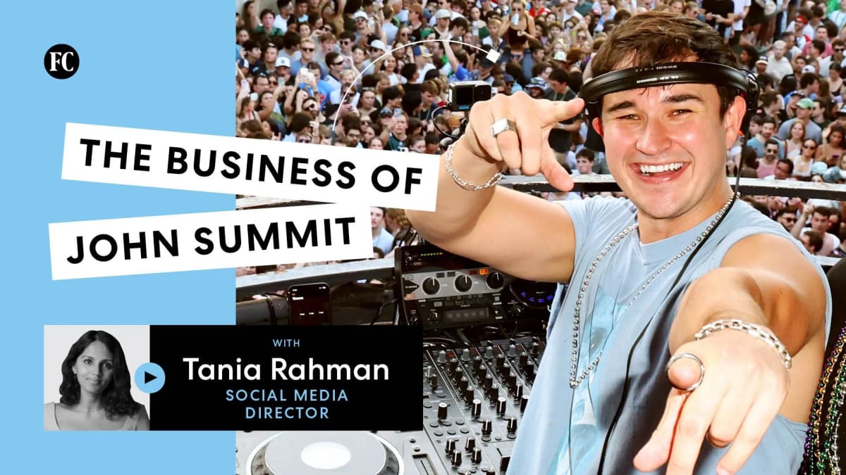 DJ John Summit performing at electronic music festival with crowd cheering