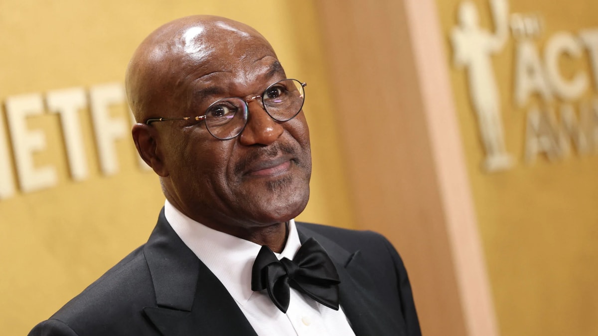 Actor Delroy Lindo smiling in formal attire at Oscar nominations celebration event