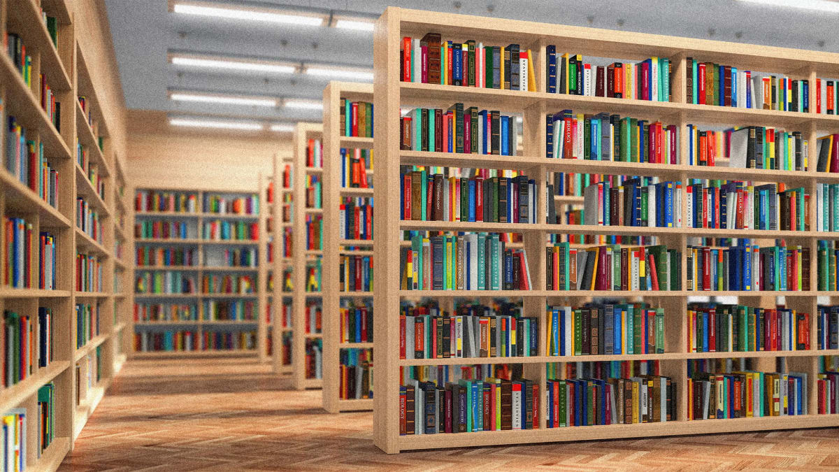 Person browsing DVD collection at modern public library with shelves of entertainment media