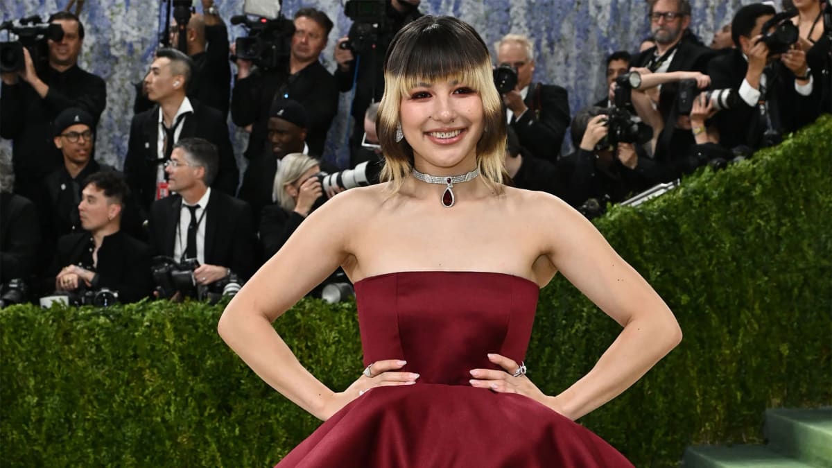 Olympic figure skater Alysa Liu in red Louis Vuitton gown at Met Gala event