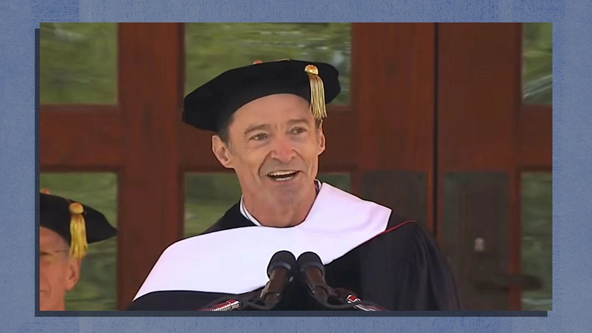 Hugh Jackman speaking at Ball State University graduation ceremony in cap and gown