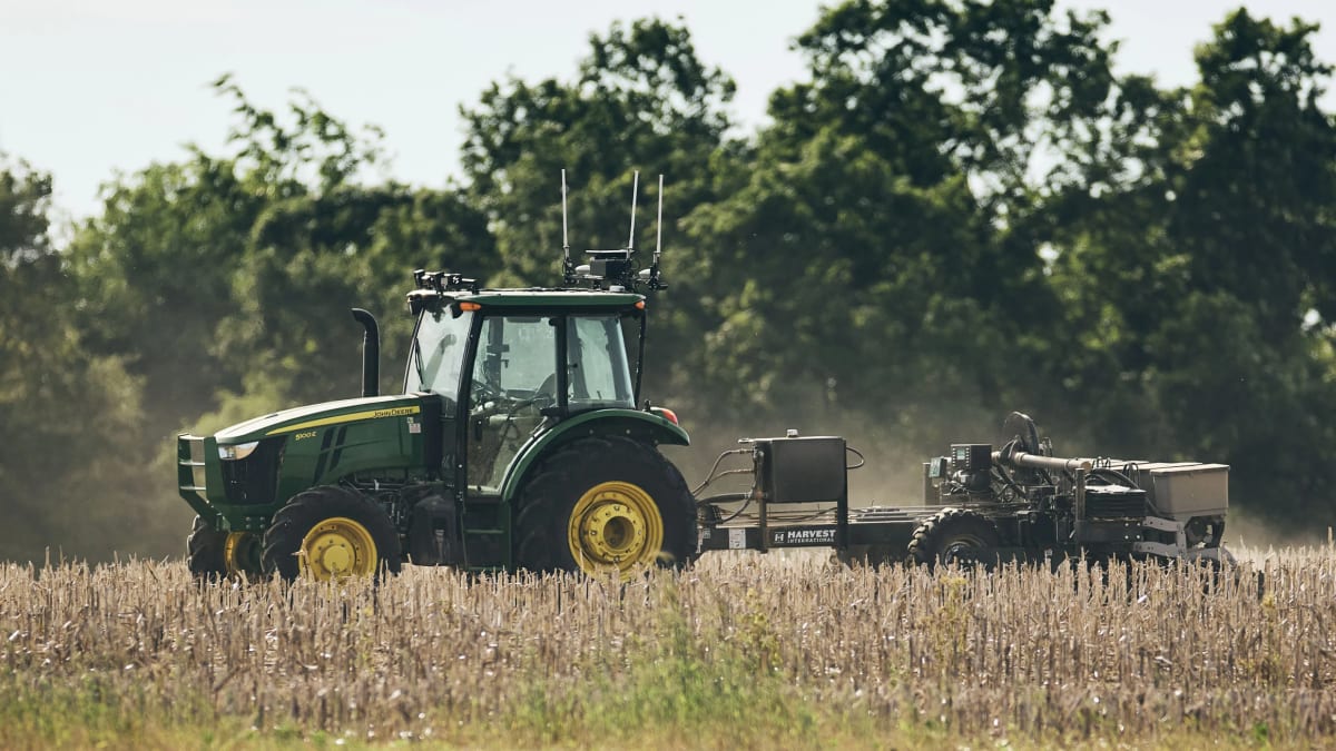 Autonomous tractor with Sabanto retrofit technology working independently in agricultural field