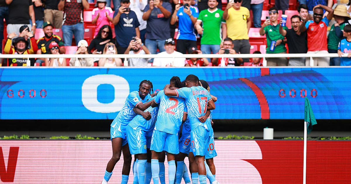 ** Swedish soccer players celebrating their World Cup qualifying goal against Poland in playoff match