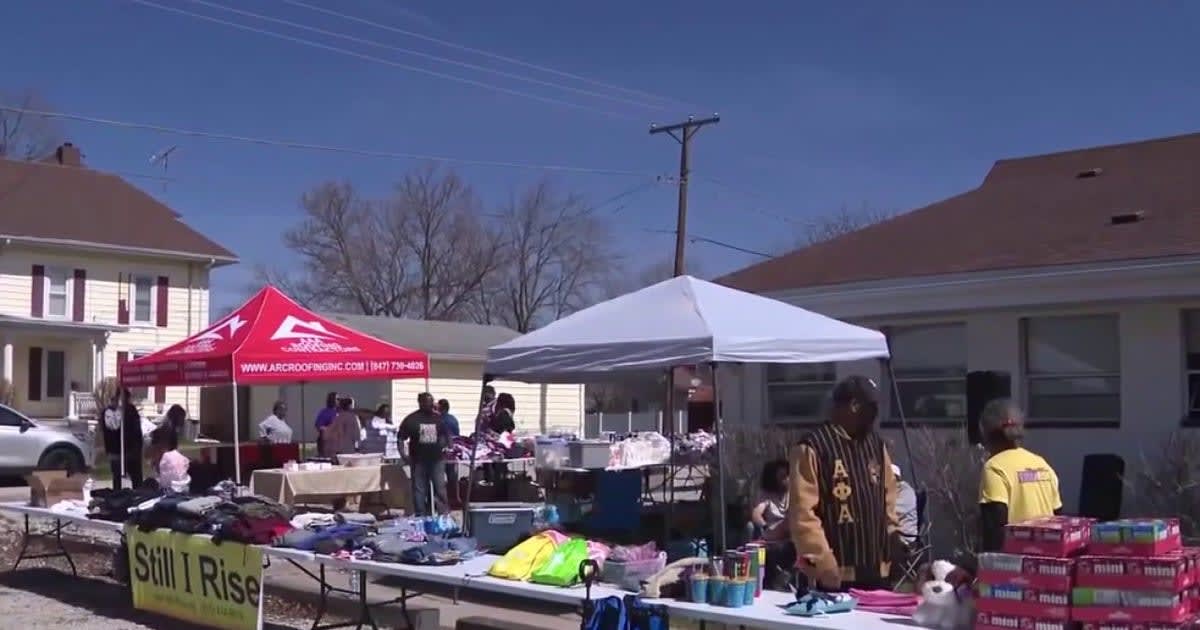 Volunteers loading care packages with essential supplies for tornado victims in Kankakee County