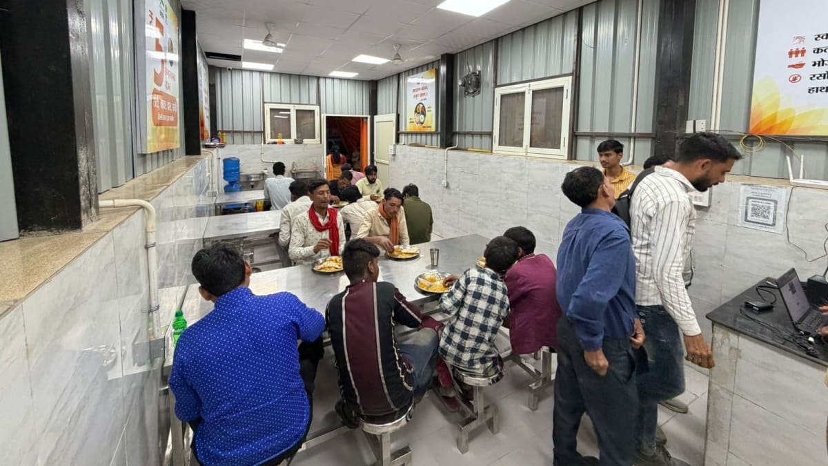 ** Diners eating affordable meals at Delhi's Anna Nagar Atal Canteen after Tuesday reopening