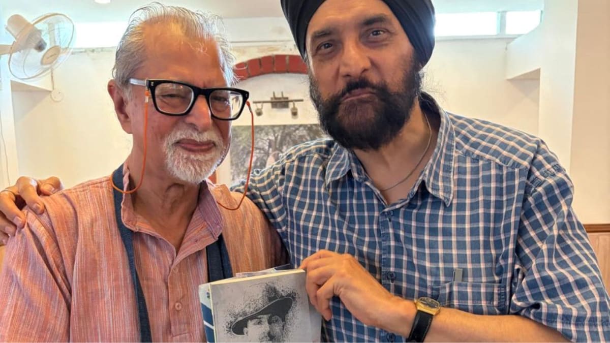 Professor Satvinder Singh Juss with scholar Chaman Lal discussing Bhagat Singh archival research discovery