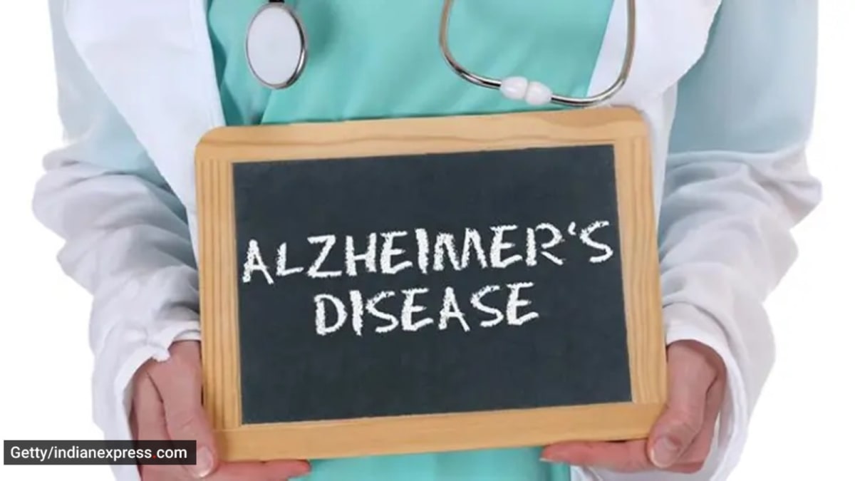Scientist examining blood sample in laboratory for Alzheimer's disease protein research