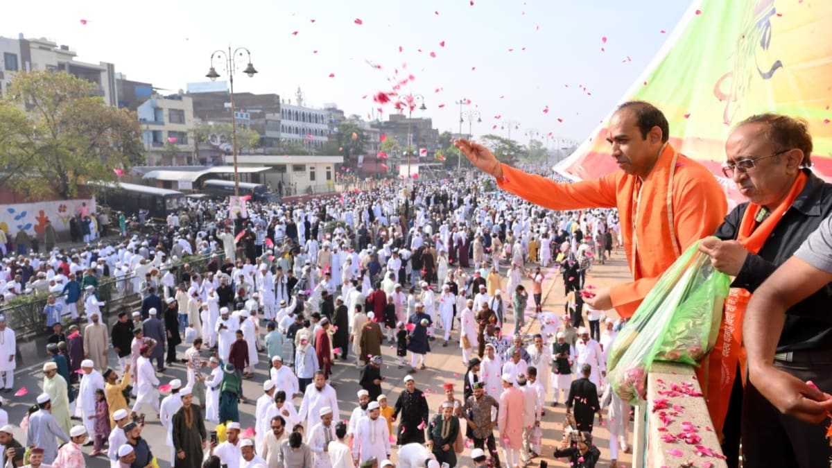 ** Hindu community members showering flower petals on Muslim worshippers during Eid prayers at Jaipur Eidgah